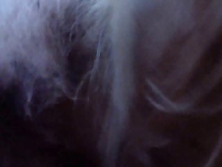 Grooming By Brushing Her Hair Before Tying It Into A